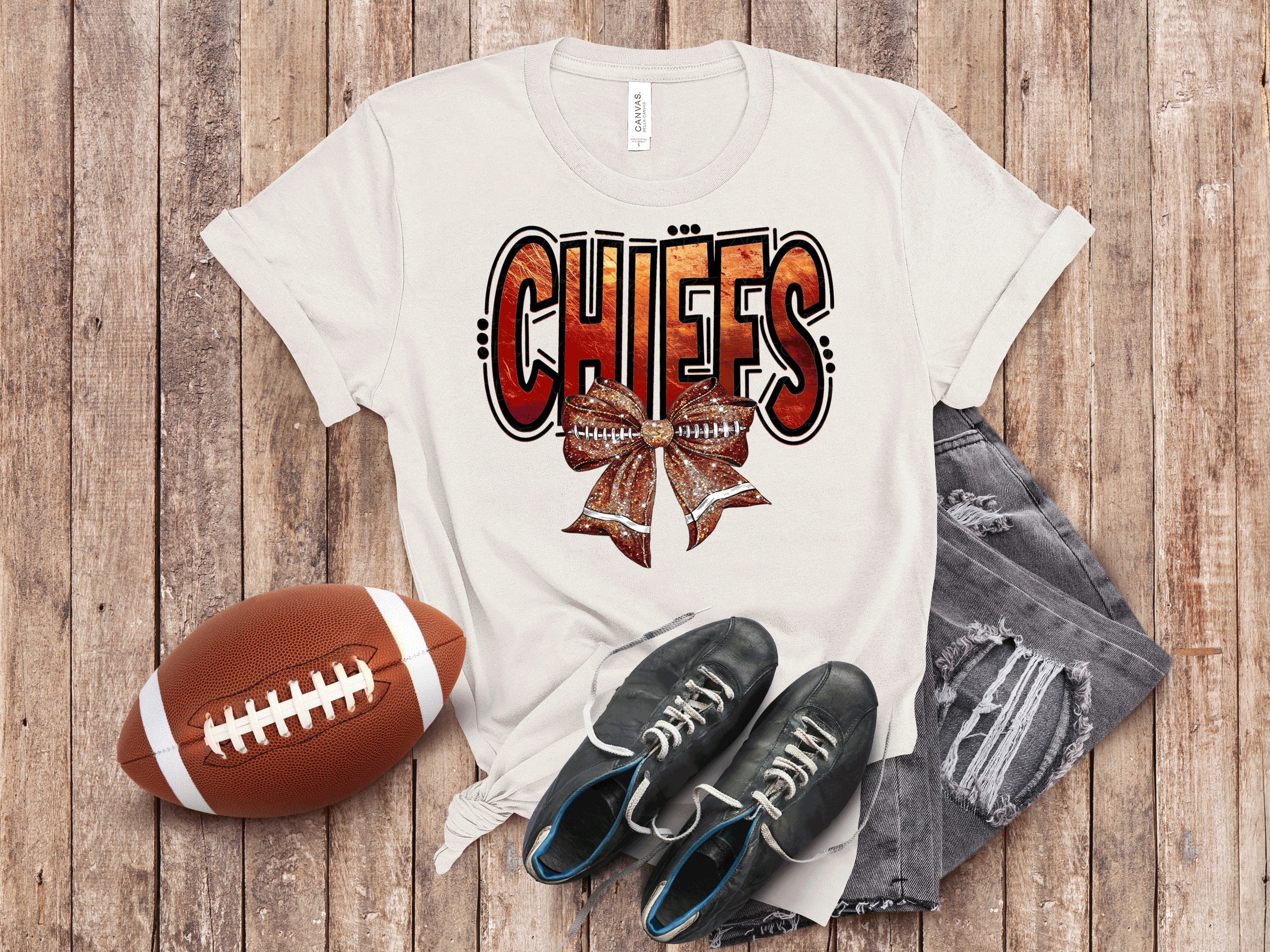 A Blessed Texas Mess Boutique Kansas City Football Metallic shirt, faux glitter football Coquette bow Shirt,… — main product shot
