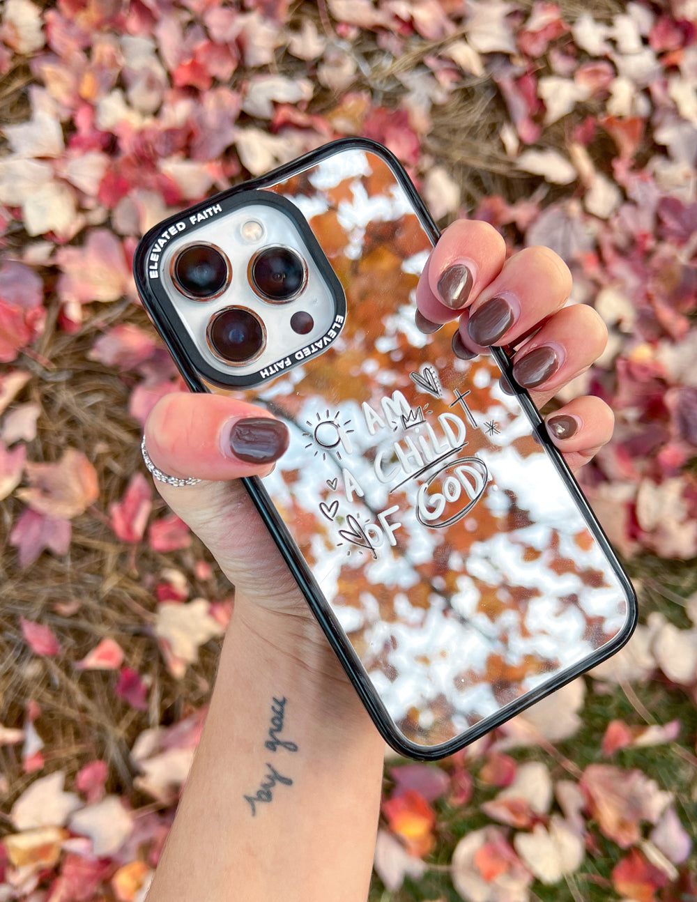 Elevated Faith Child of God Mirror Phone Case — side view