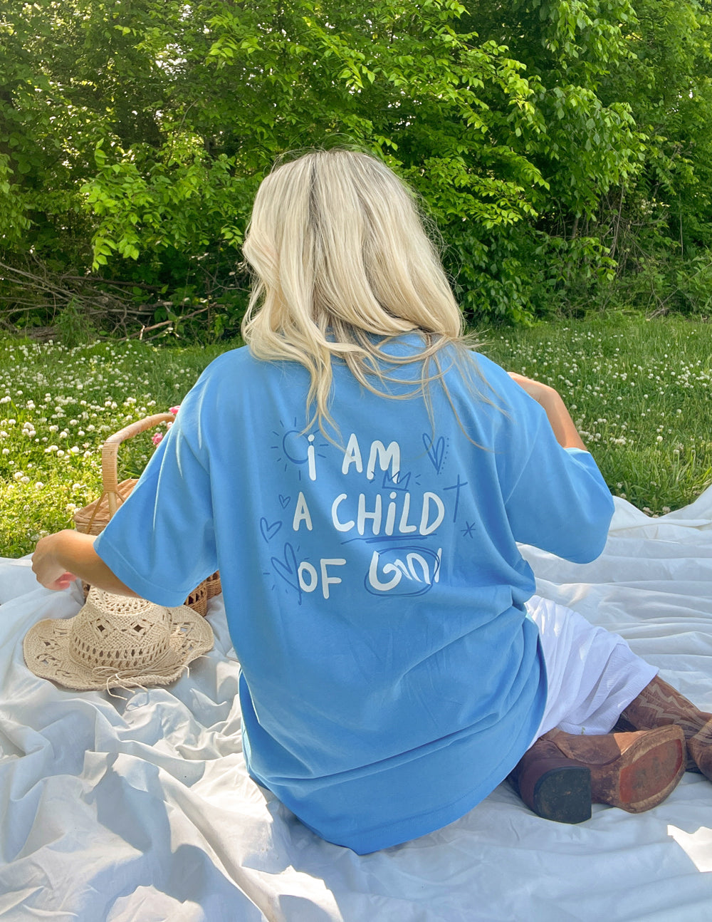 Elevated Faith Child of God Unisex Tee — lifestyle worn / used context