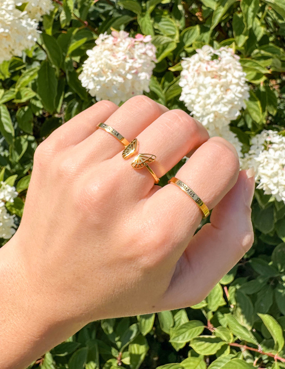 Elevated Faith Butterfly Ring — detail close-up