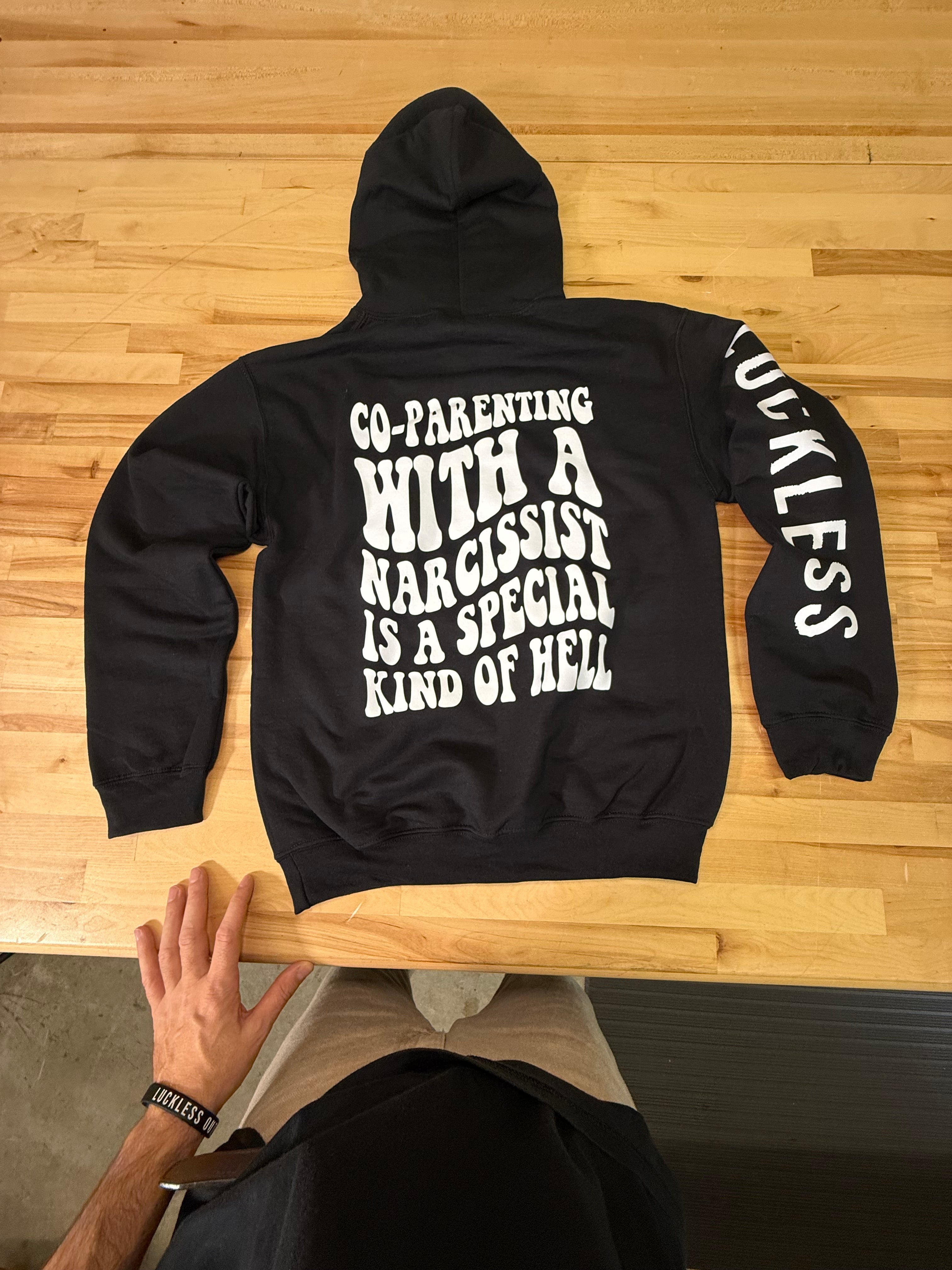 Luckless Outfitters Co-Parenting With A Narcissist Hoodie — side view