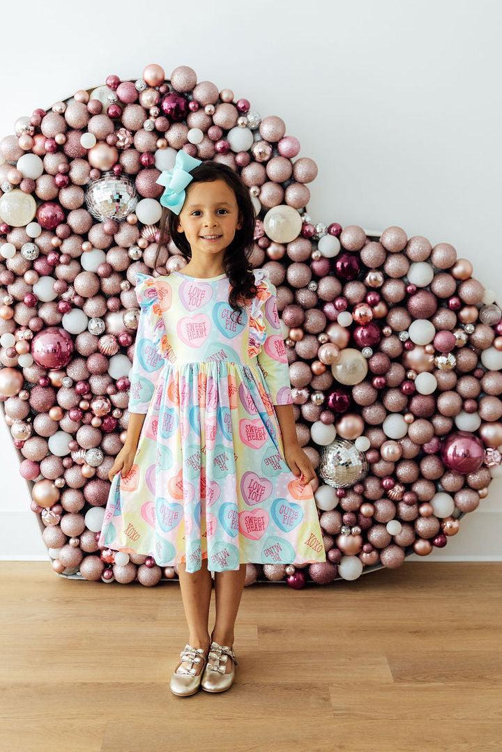 Mila & Rose ® Conversation Hearts 3/4 Sleeve Ruffle Twirl Dress — lifestyle context