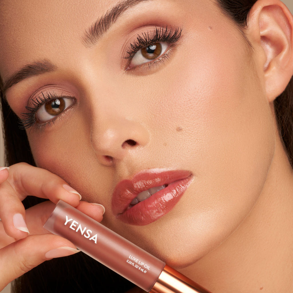 YENSA Luxe Lip Nourishing Oil with Hyaluronic + Vitamin E — flat-lay composition