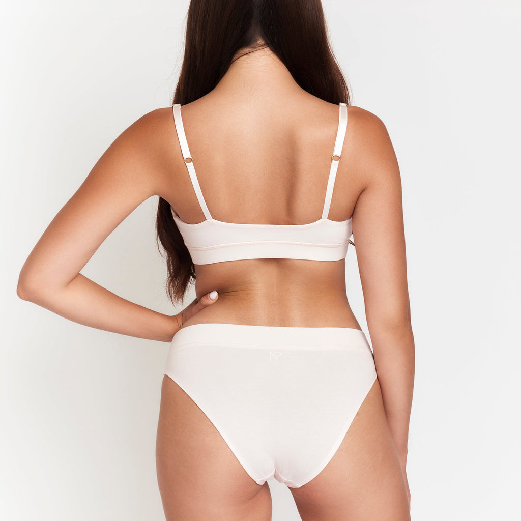 Net Positive Cheeky Tanga — Net Positive branding close-up