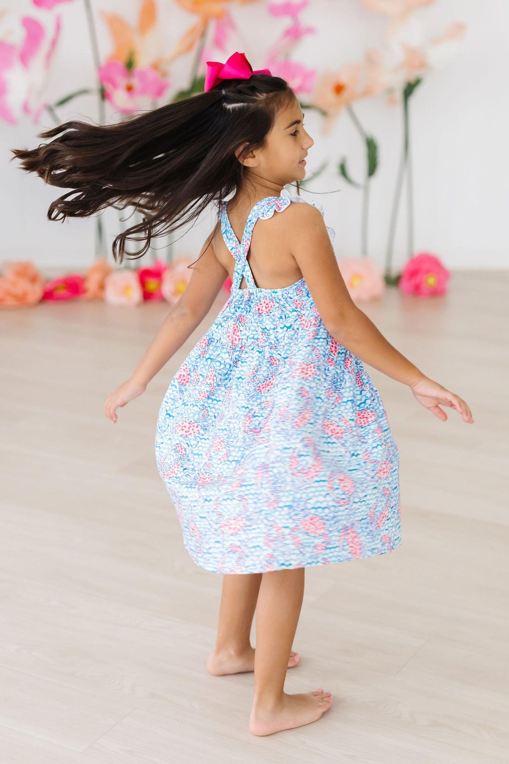 Mila & Rose ® Crab Walk Ruffle Cross Back Dress — back view