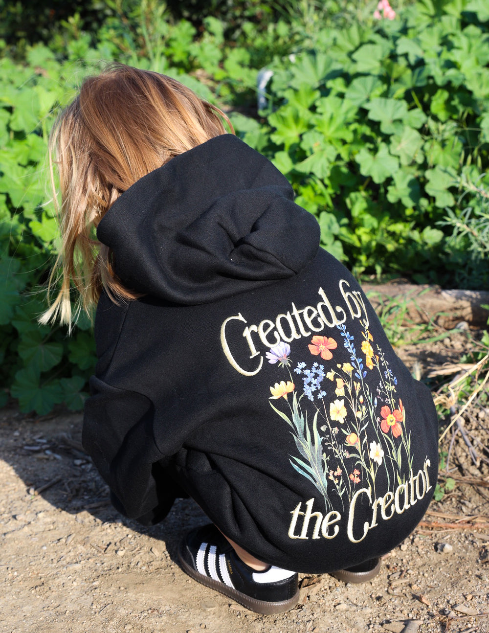 Elevated Faith Created by the Creator Kids Hoodie — lifestyle worn / used context