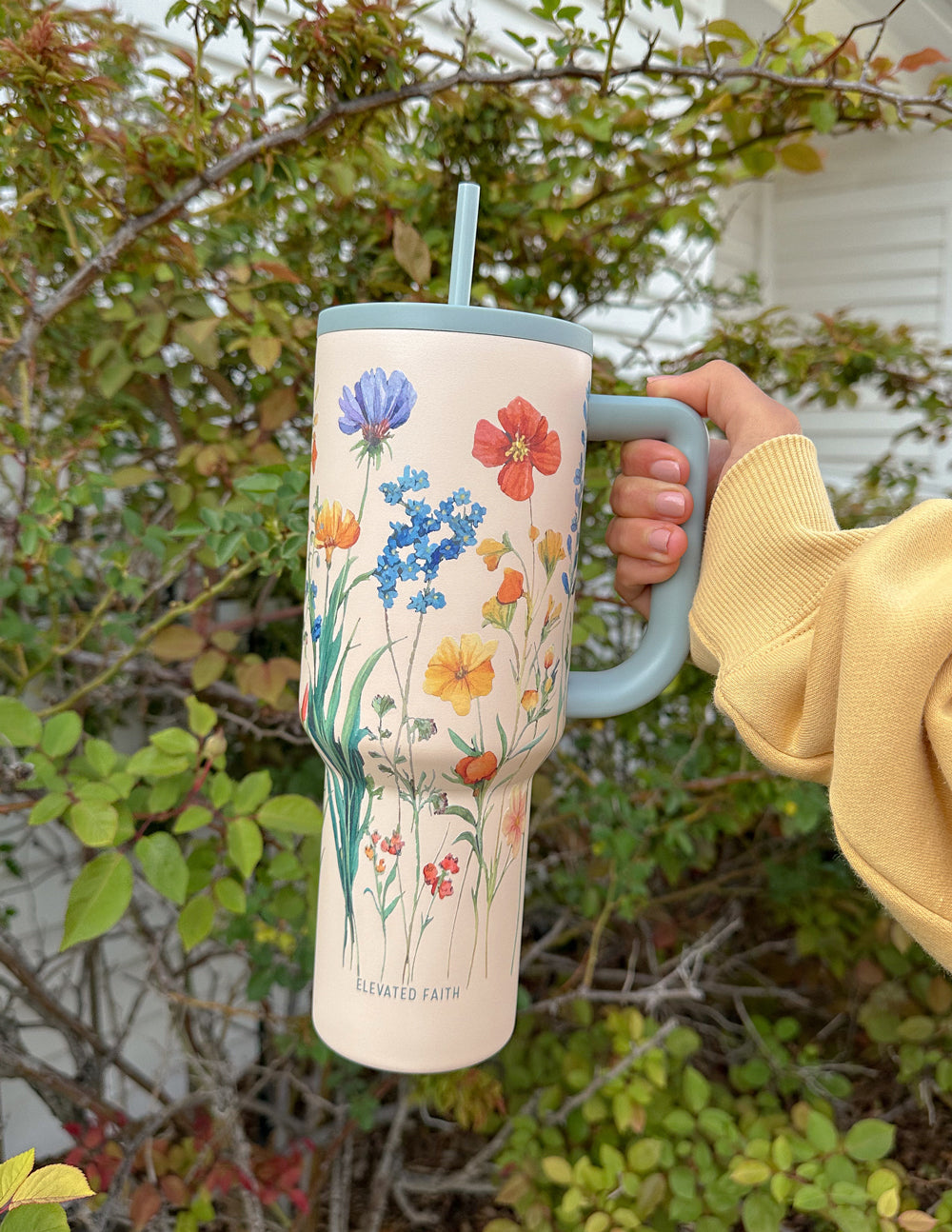 Elevated Faith Creation 40 oz Ascend Tumbler — lifestyle worn / used context
