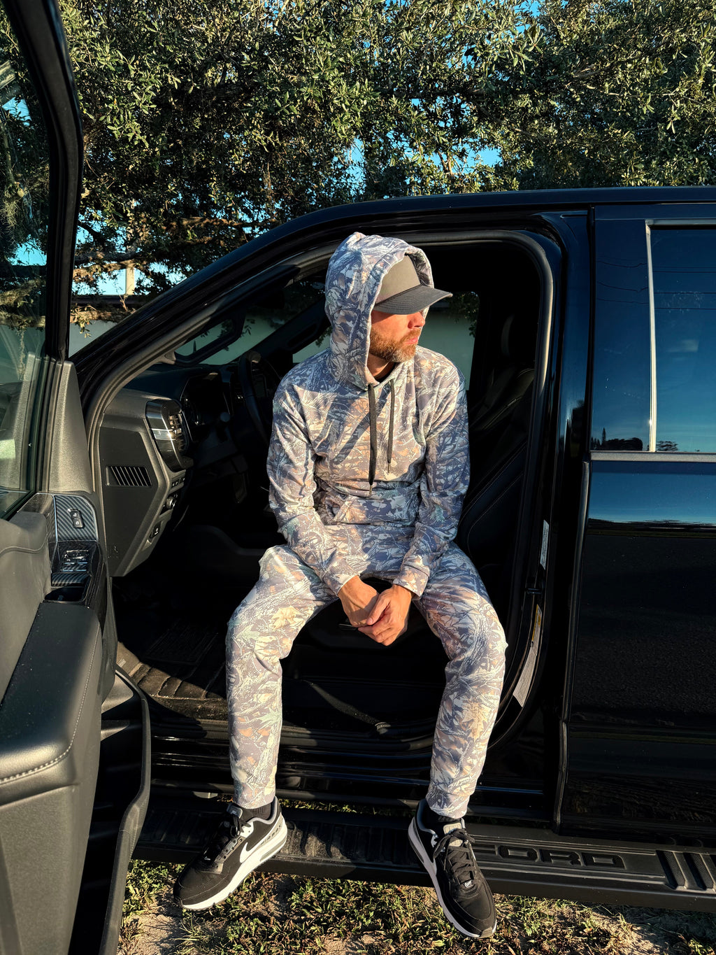 Luckless Outfitters Faded Camo Jogger Sweatpants — lifestyle context
