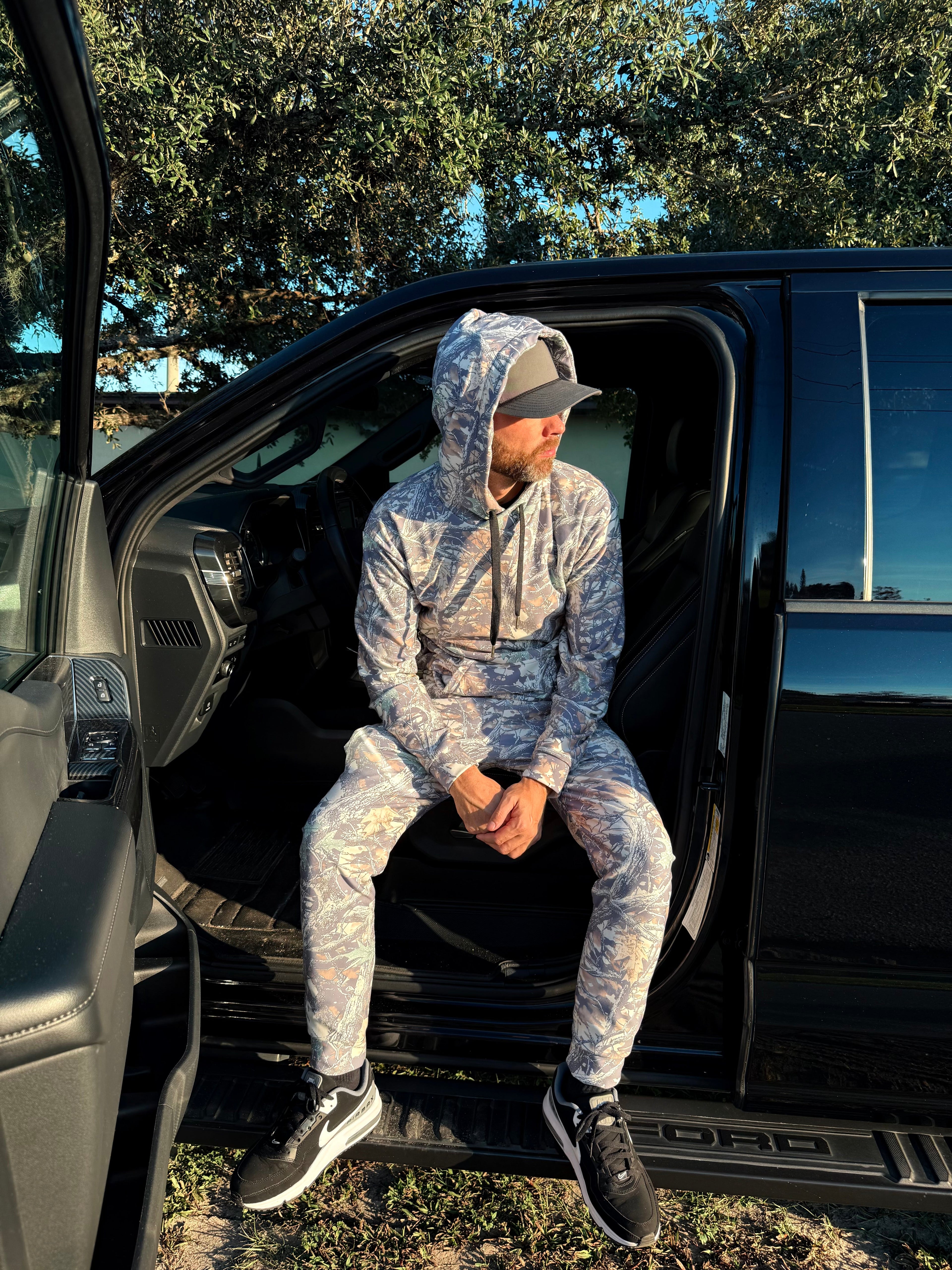 Luckless Outfitters Faded Camo Jogger Sweatpants — lifestyle context