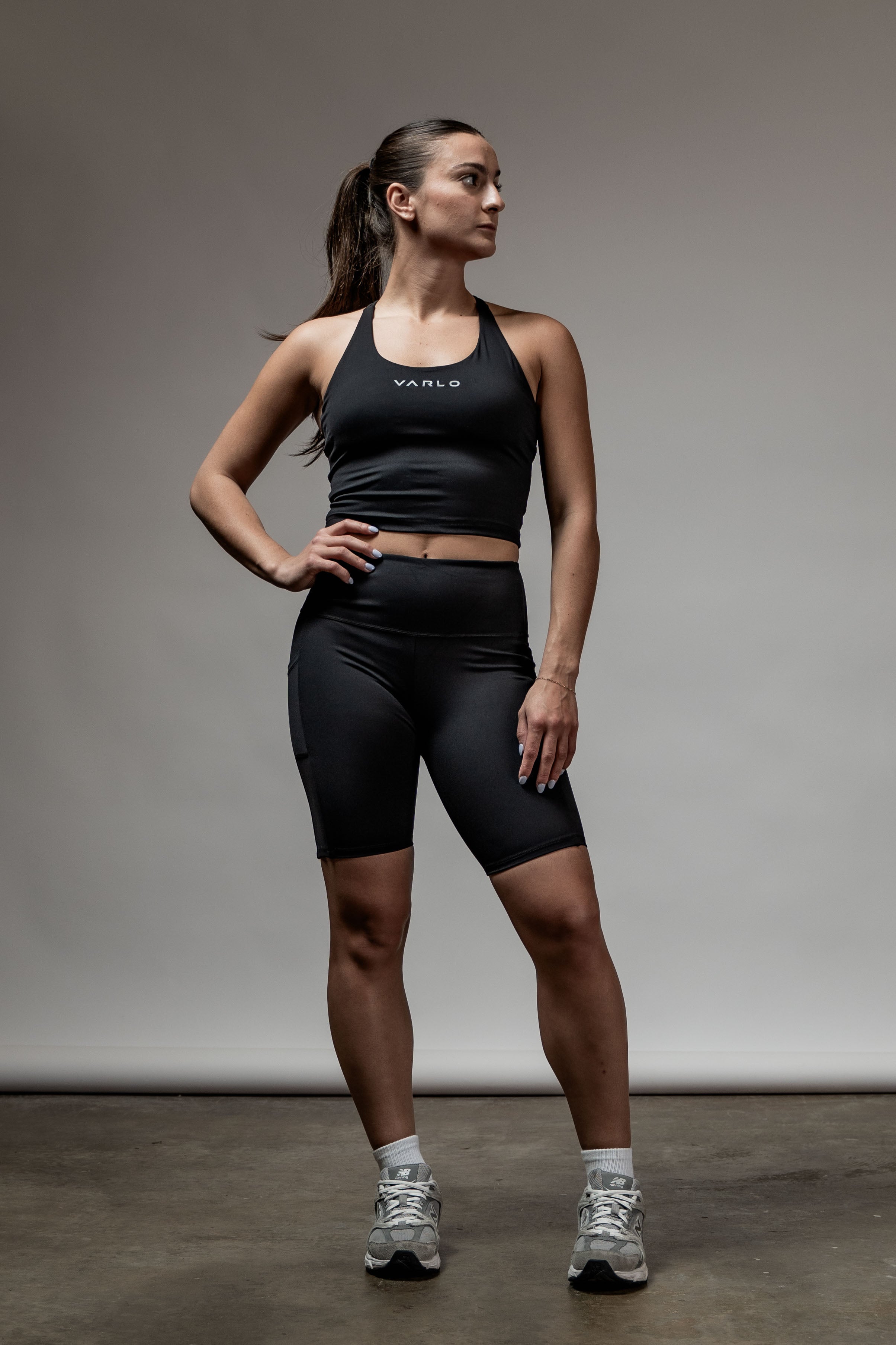 Varlo Varlo SOHO Women's Technical High Rise Shorts 8" (Black) — comparison shot