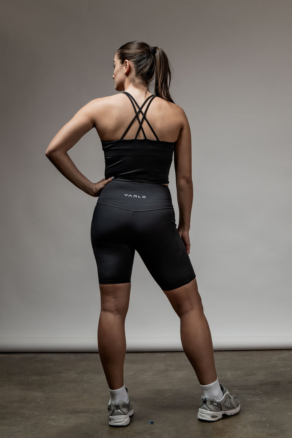 Varlo SOHO Women's Technical High Rise Shorts 8" (Black) — lifestyle worn / used context