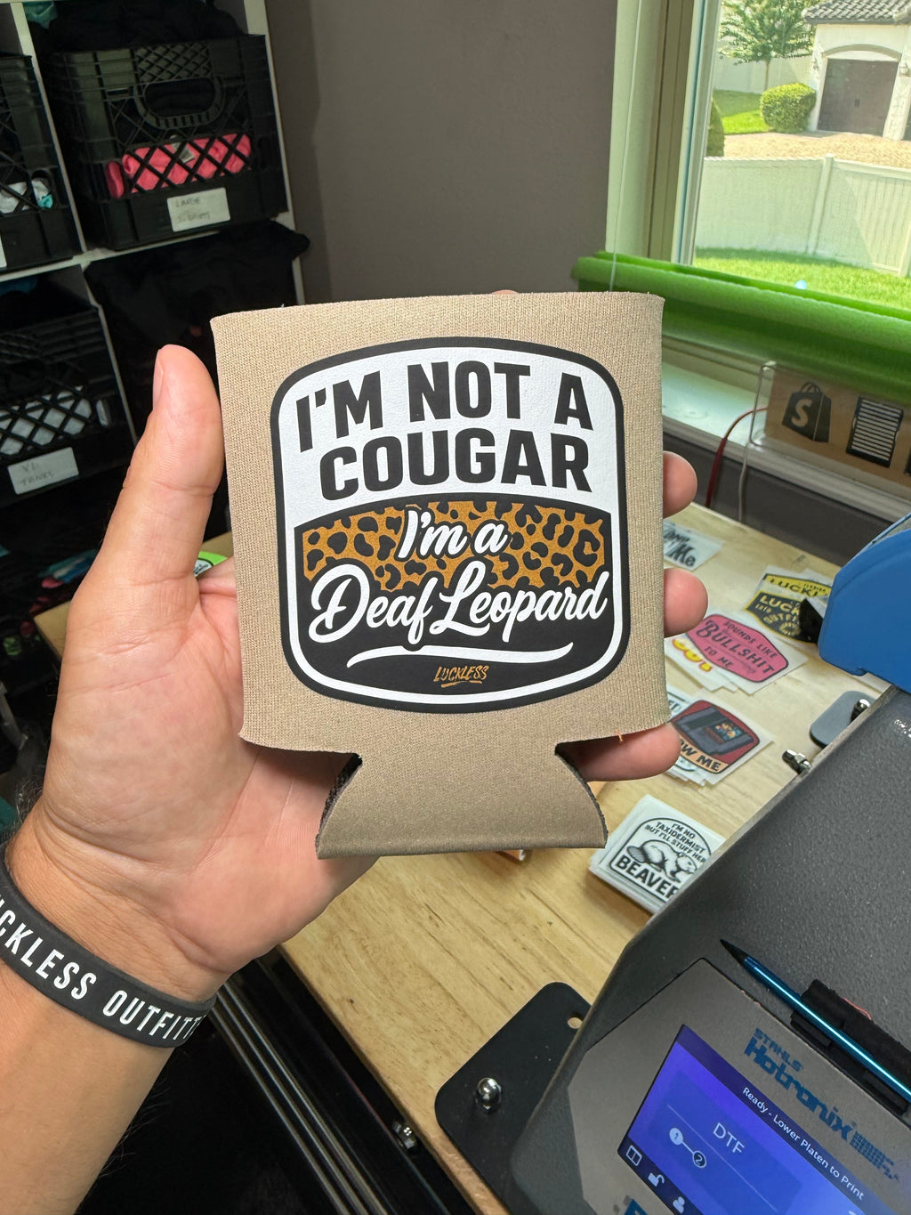 Luckless Outfitters Deaf Leopard Koozie — detail close-up