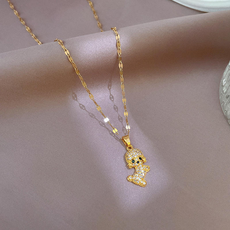 SORI STYLE Diamond Puppy Pendant Necklace — lifestyle context