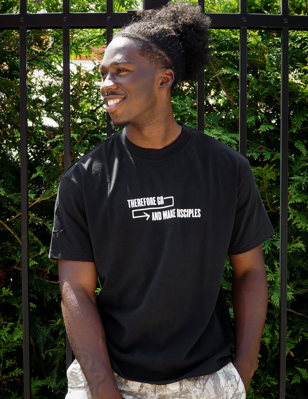 Elevated Faith Disciples Unisex Tee — lifestyle context