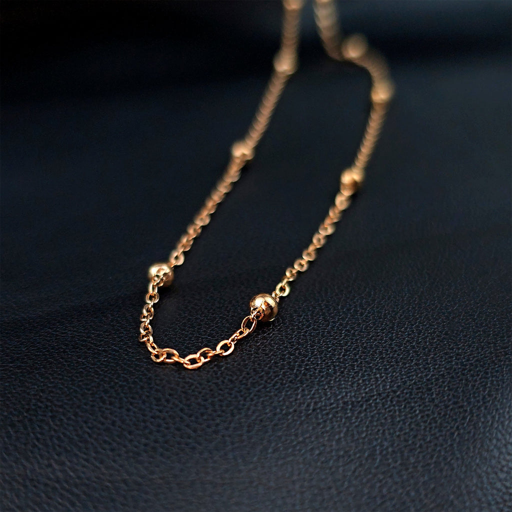 BodyCandy Stainless Steel Ball Rose Gold Tone PVD Station Necklace Satellite Chain Layering Necklace — detail close-up
