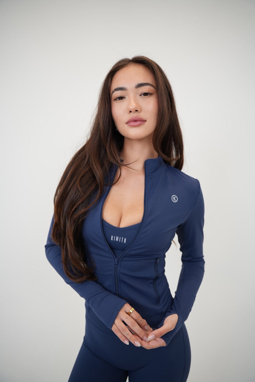 KIMITH BRAND I Live in Luxury Navy Blue Sports Bra — in-use photo