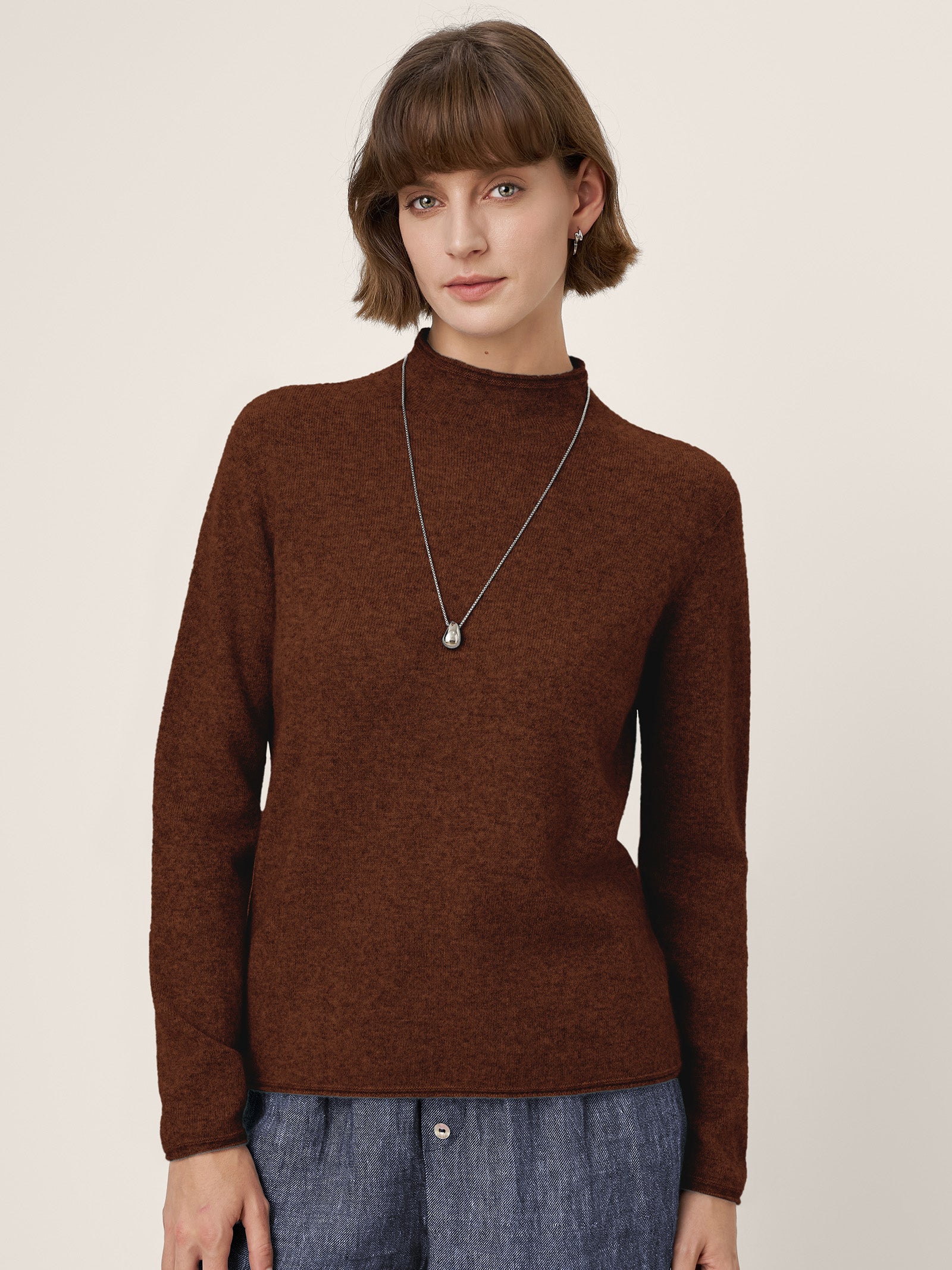 LINTICO Premium Cashmere Blend Hand-Finished Seamless Mock Neck Lettuce Edge Sweater ZELIE — packaging
