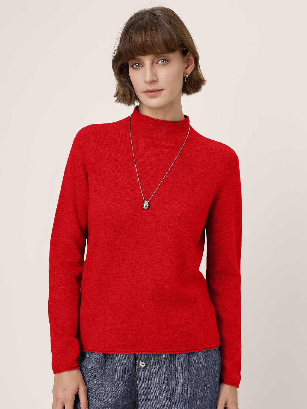LINTICO Premium Cashmere Blend Hand-Finished Seamless Mock Neck Lettuce Edge Sweater ZELIE — product on model