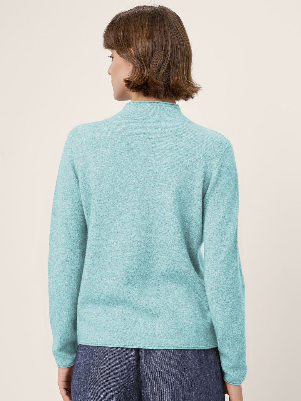 LINTICO Premium Cashmere Blend Hand-Finished Seamless Mock Neck Lettuce Edge Sweater ZELIE — lifestyle context