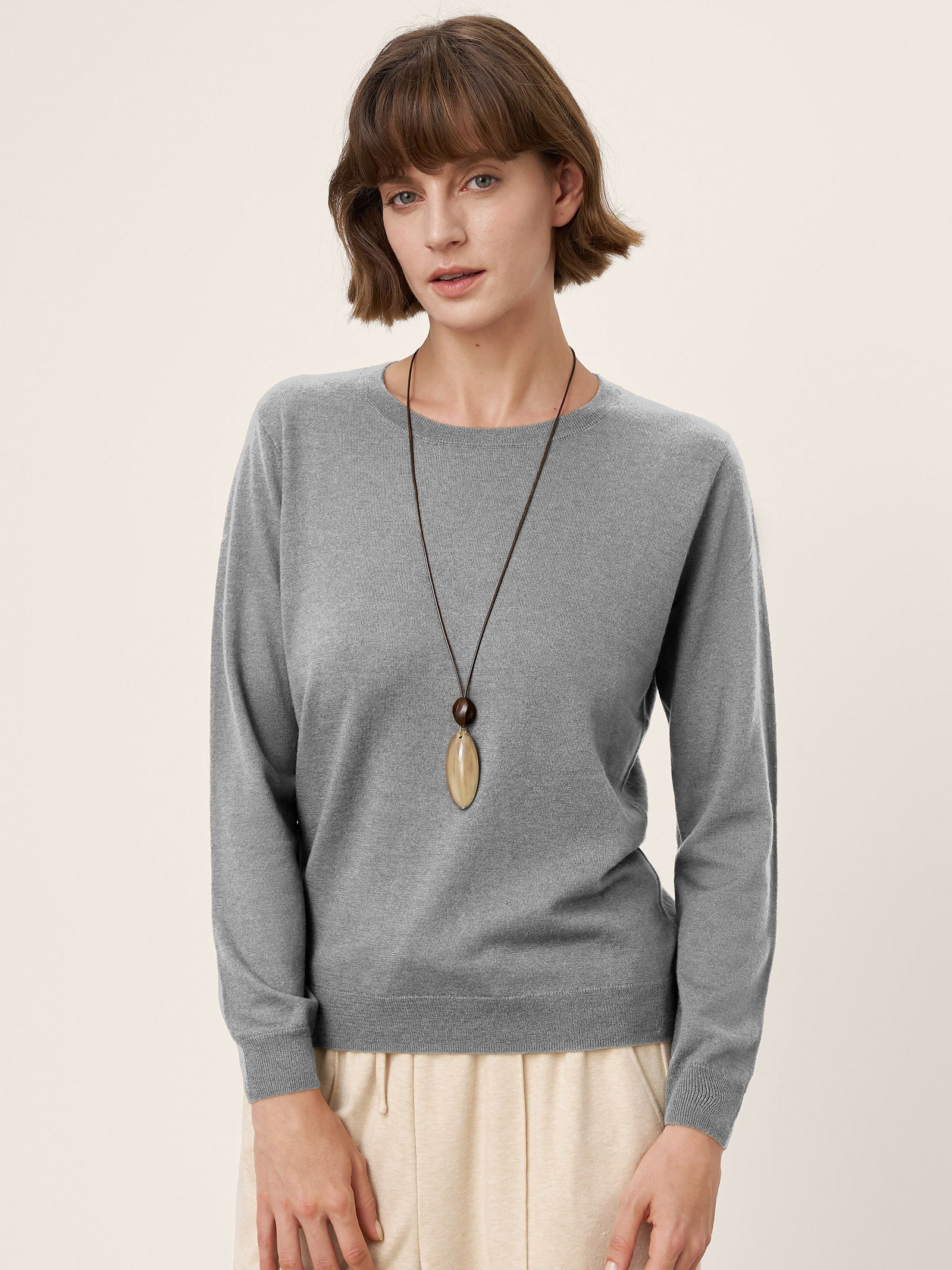 LINTICO 100% Extra-Fine Merino Wool Essential Crew Neck Knit Sweater BRIDGET — flat-lay composition