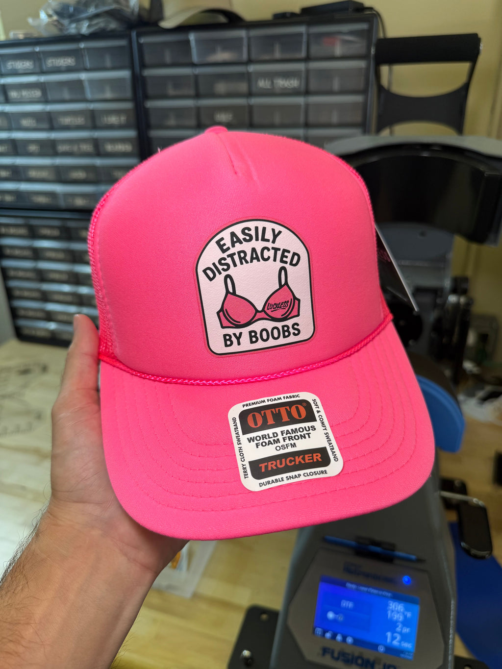 Luckless Outfitters Easily Distracted Trucker Hat — back view