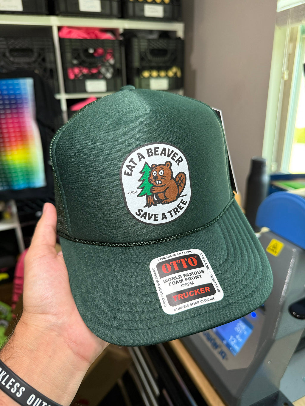 Luckless Outfitters Eat A Beaver Save A Tree Trucker Hat — detail close-up