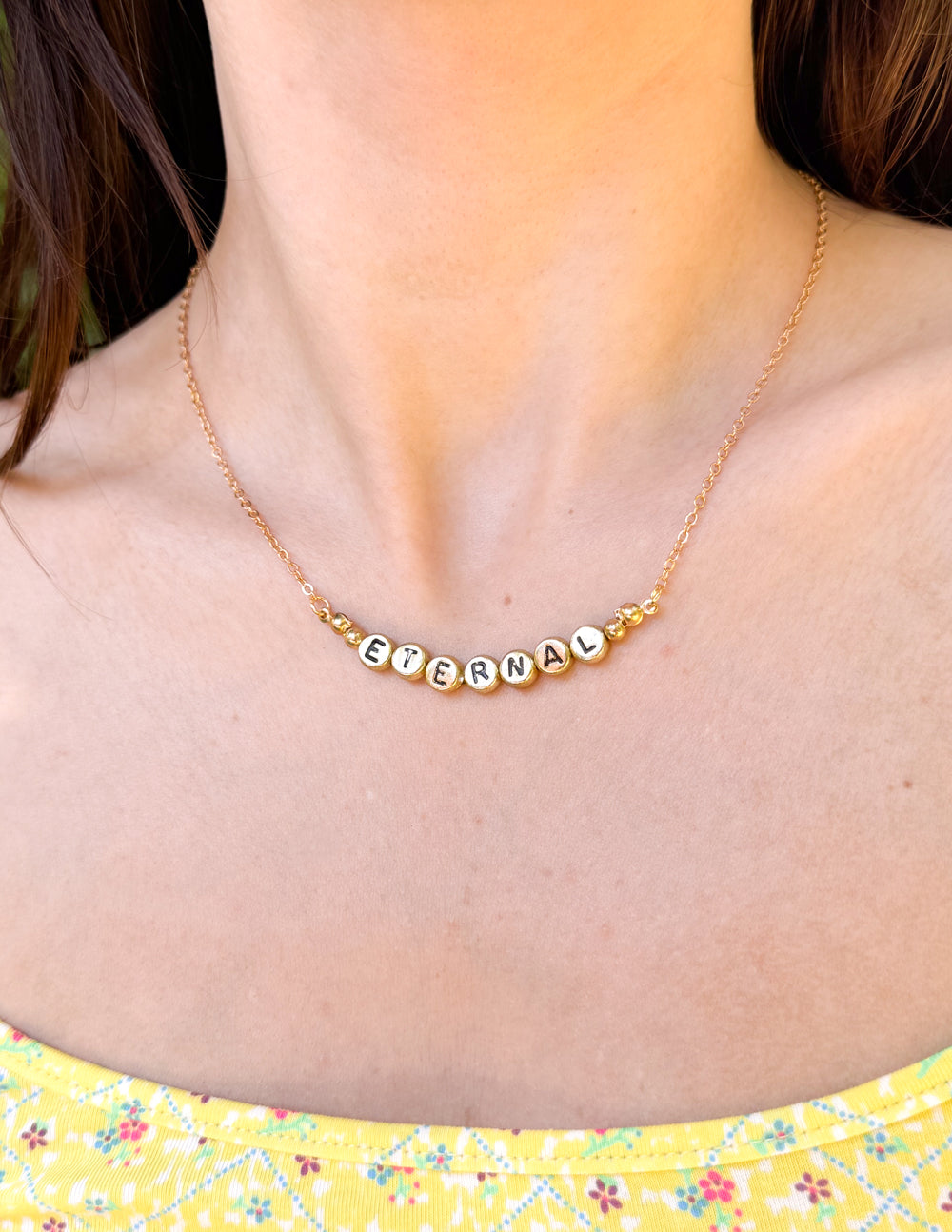 Elevated Faith Eternal Letter Necklace — detail close-up