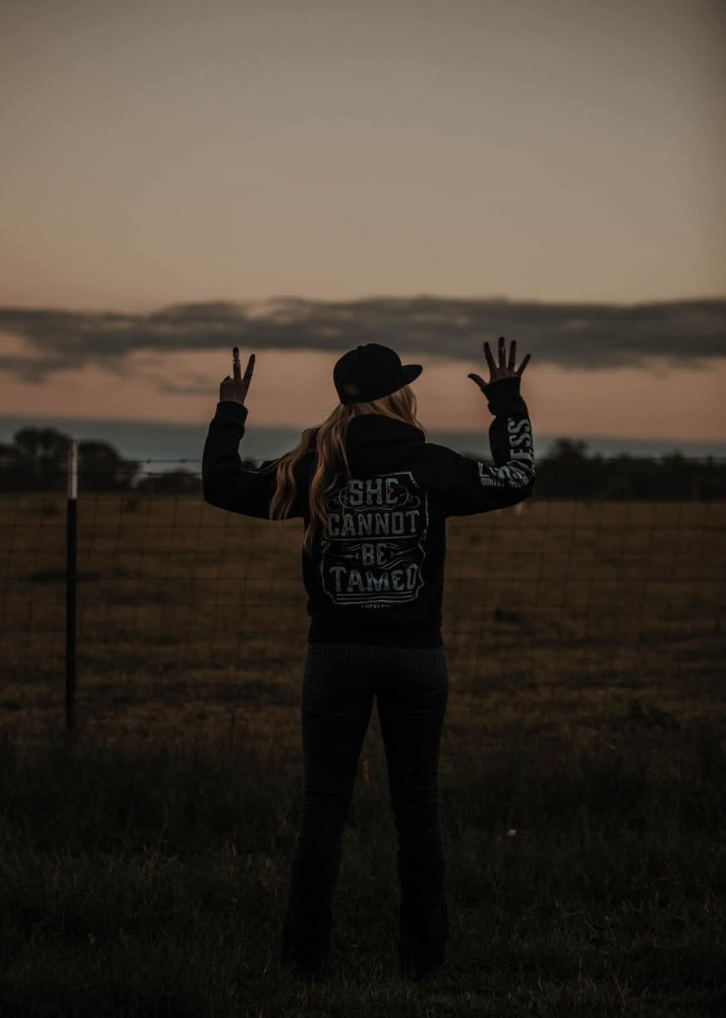 Luckless Outfitters She Cannot Be Tamed Hoodie — back view