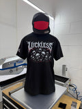 Luckless Outfitters Pile of Skulls Tee — detail close-up