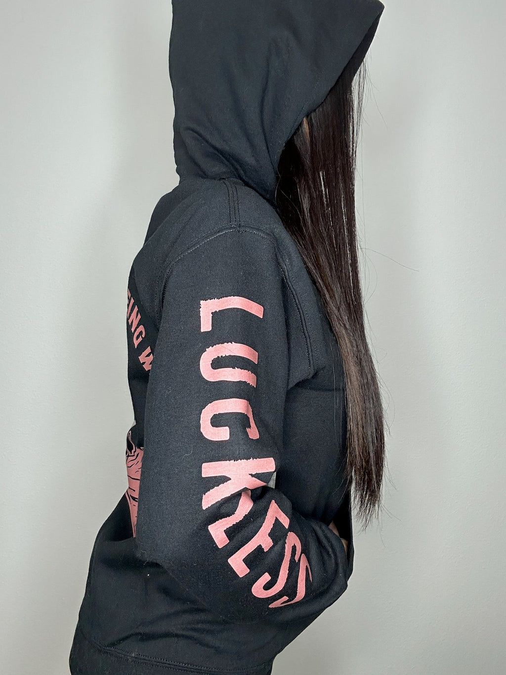 Luckless Outfitters Out Here Being Wild Hoodie in Dusty Coral — back view