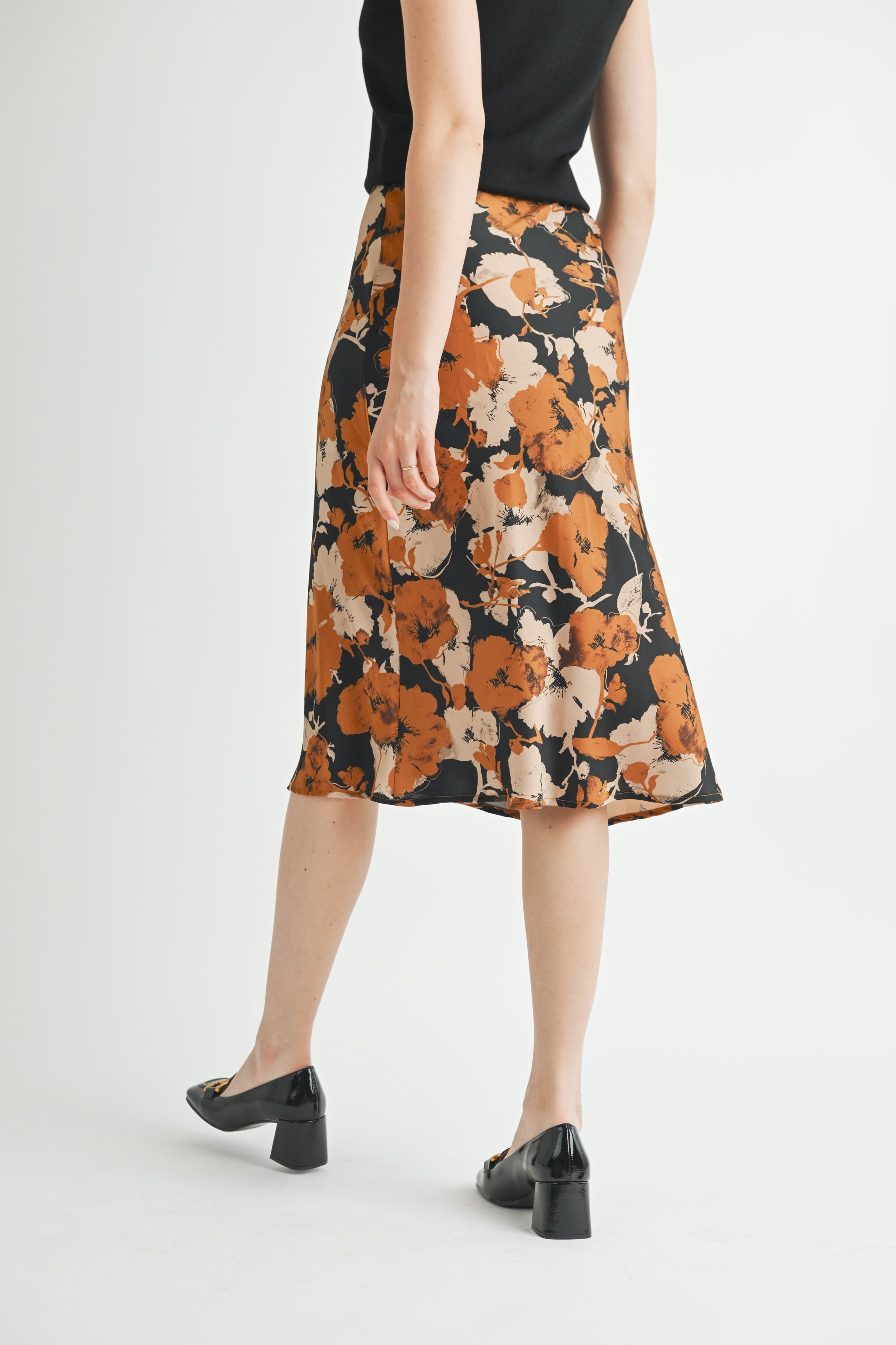 KADOU BOUTIQUE Black Floral Midi Skirt — lifestyle context