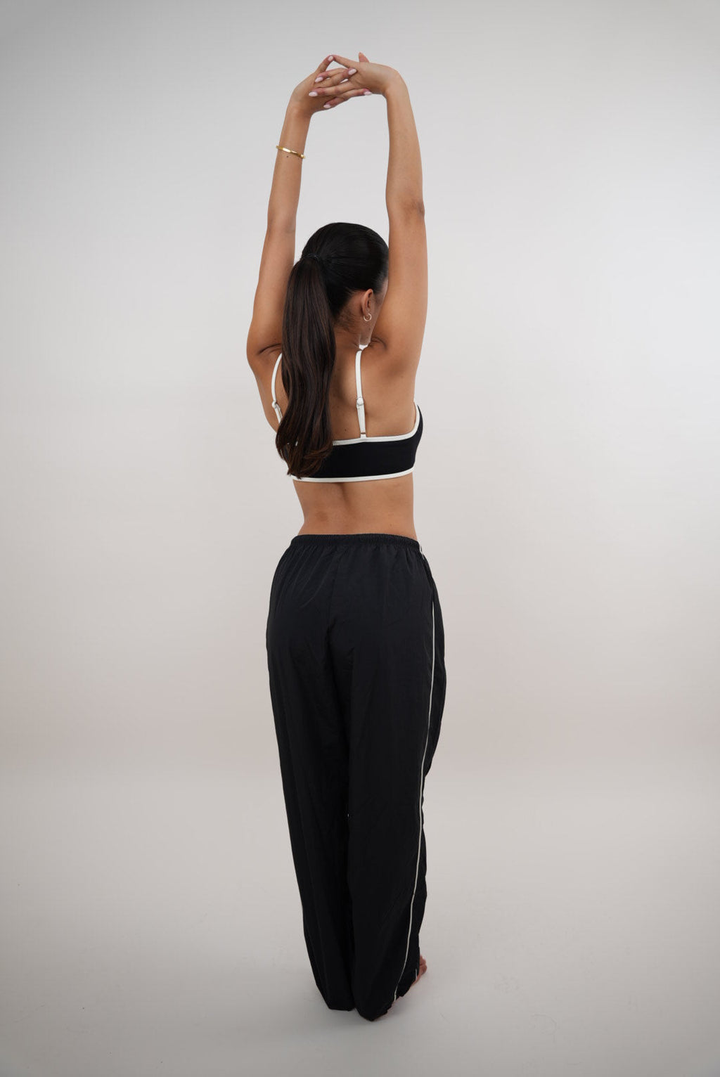 KIMITH BRAND I Accept Change with Grace Black Versatile Relaxed Fit Pant — lifestyle context