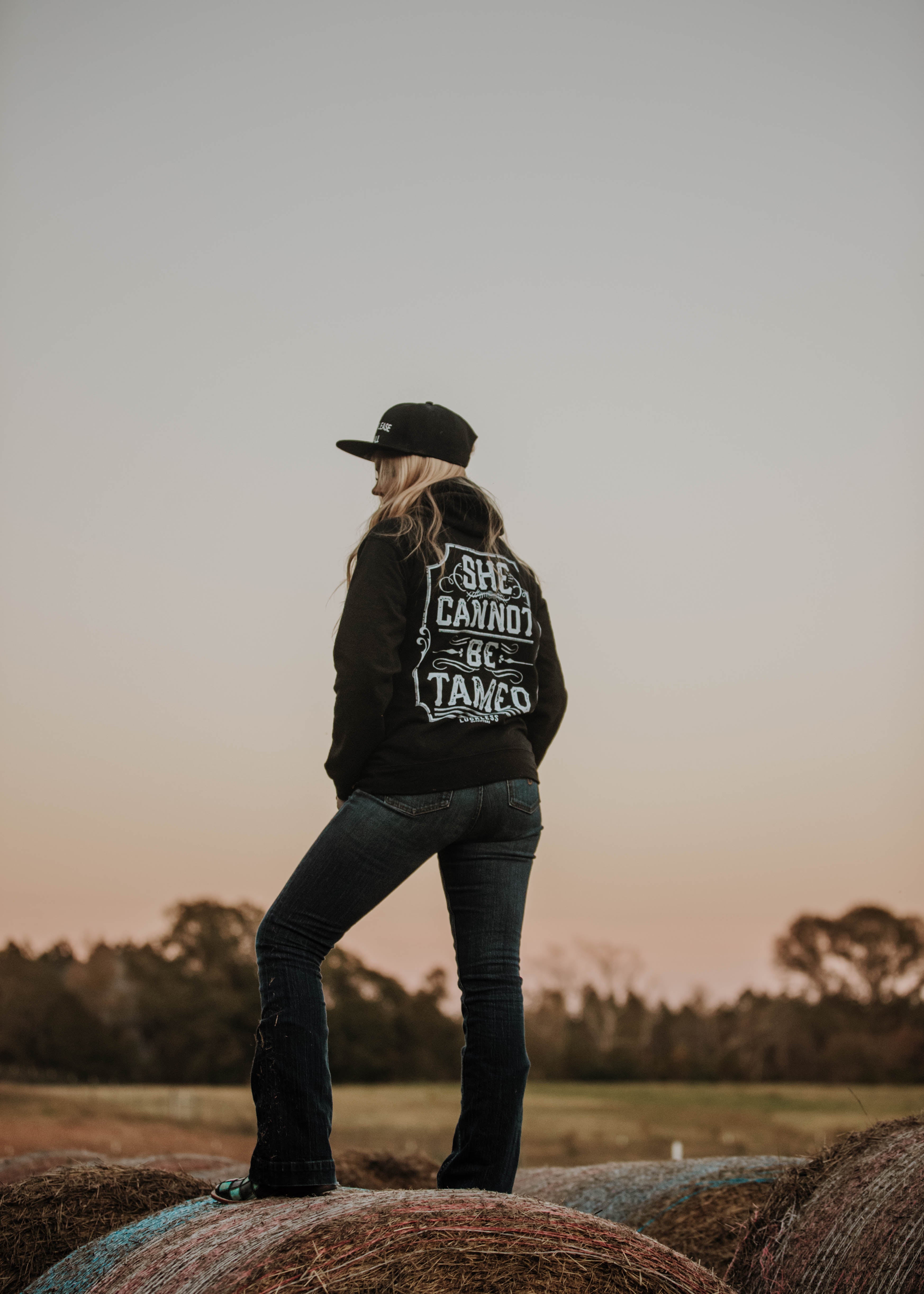 Luckless Outfitters She Cannot Be Tamed Hoodie — side view