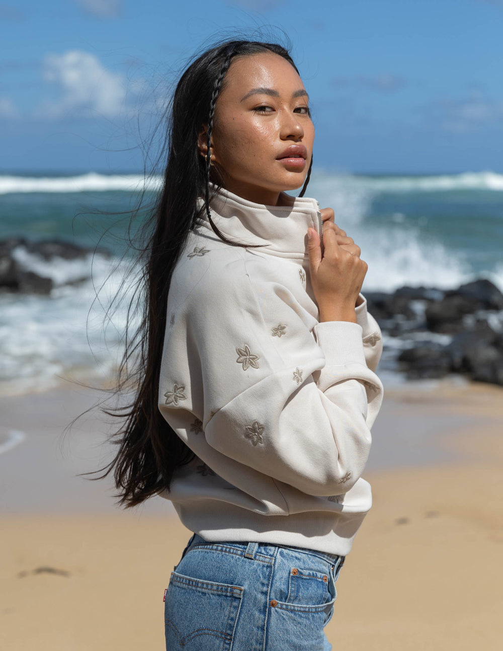 Elevated Faith Floral Women's Half-Zip — Elevated Faith branding close-up