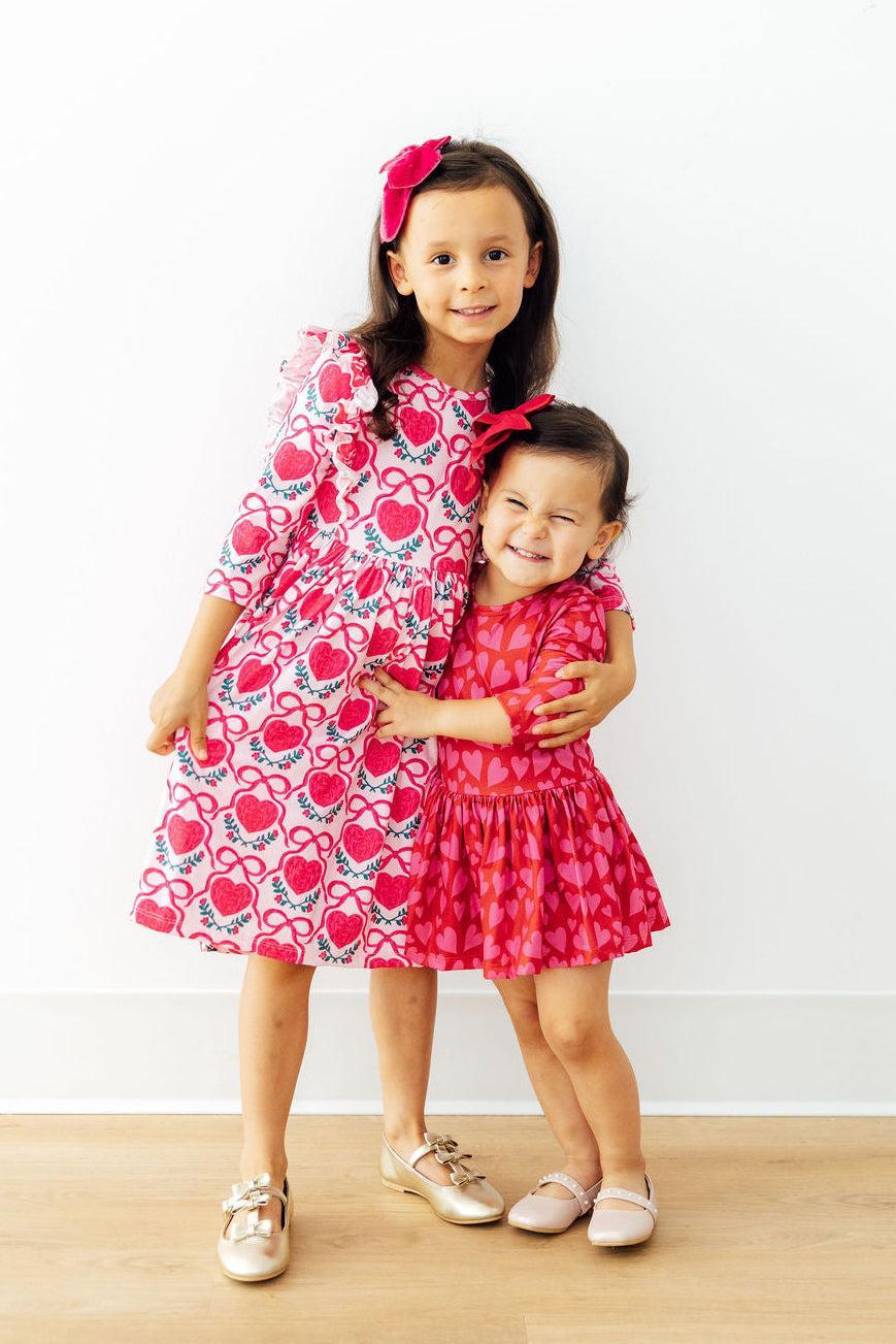 Mila & Rose ® Hearts & Hugs 3/4 Sleeve Twirl Bodysuit — lifestyle context