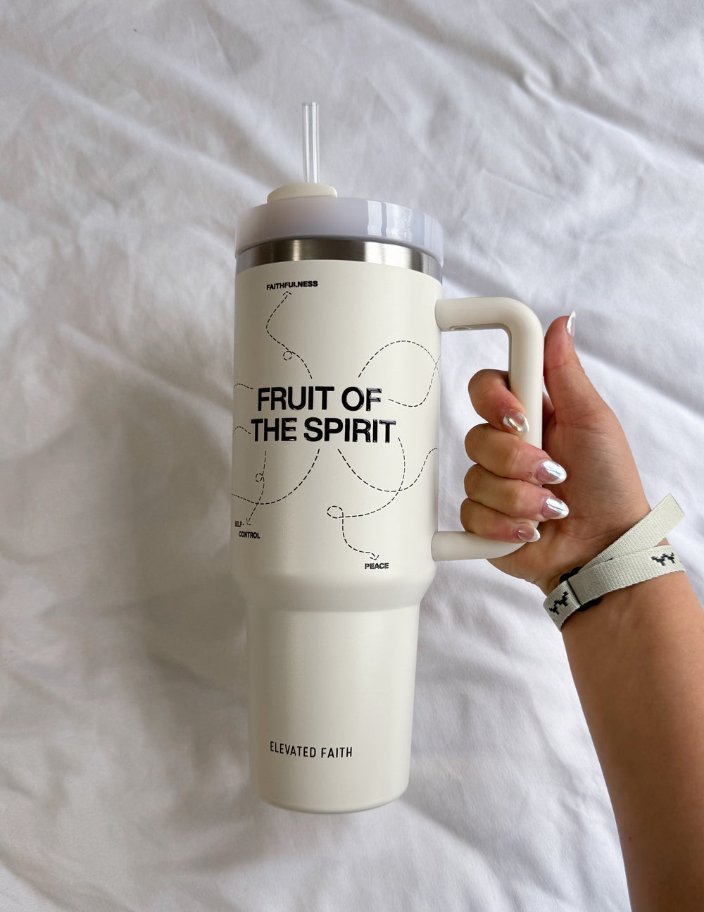 Elevated Faith Fruit of the Spirit 40 oz Tumbler — lifestyle worn / used context