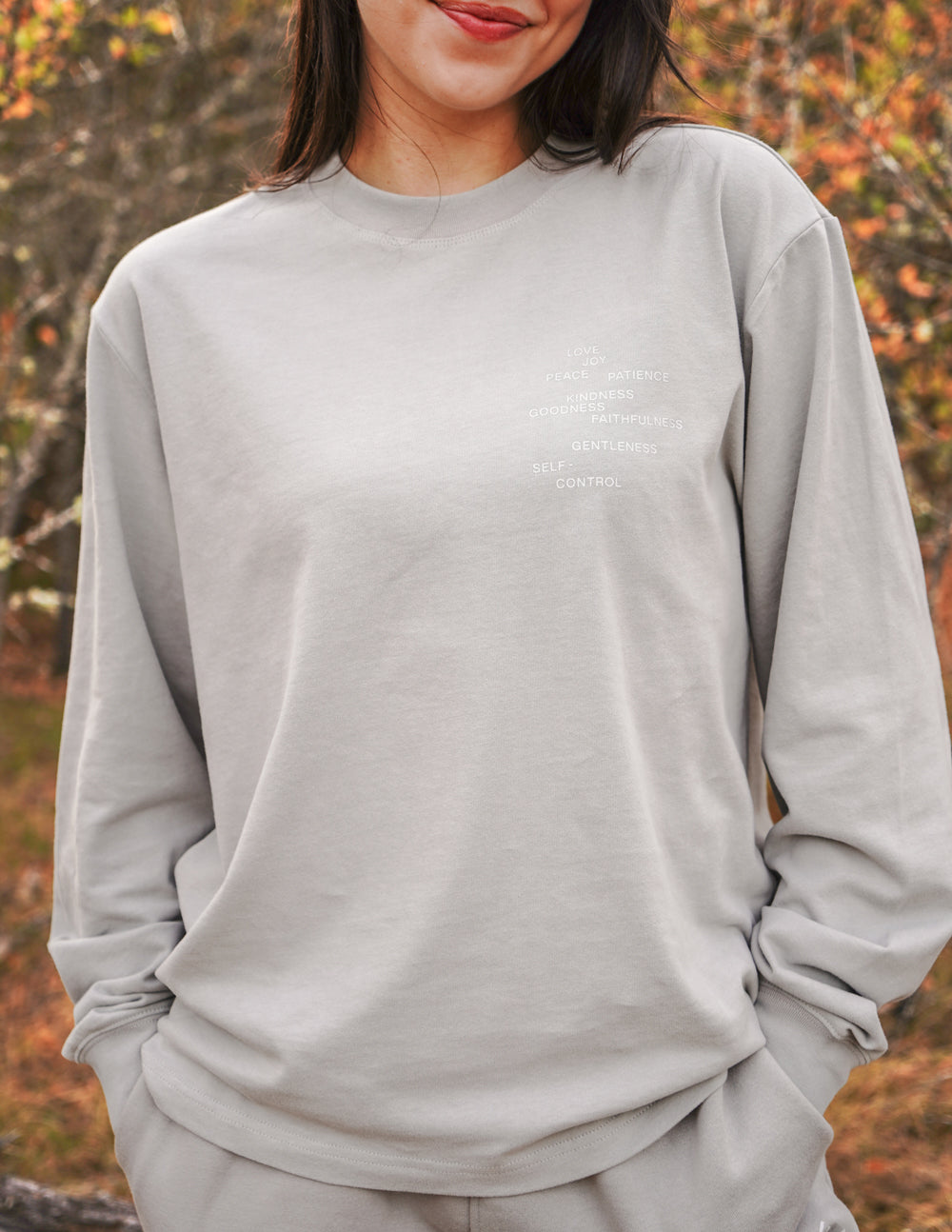 Elevated Faith Fruit of the Spirit Grey LS Unisex Tee — lifestyle context
