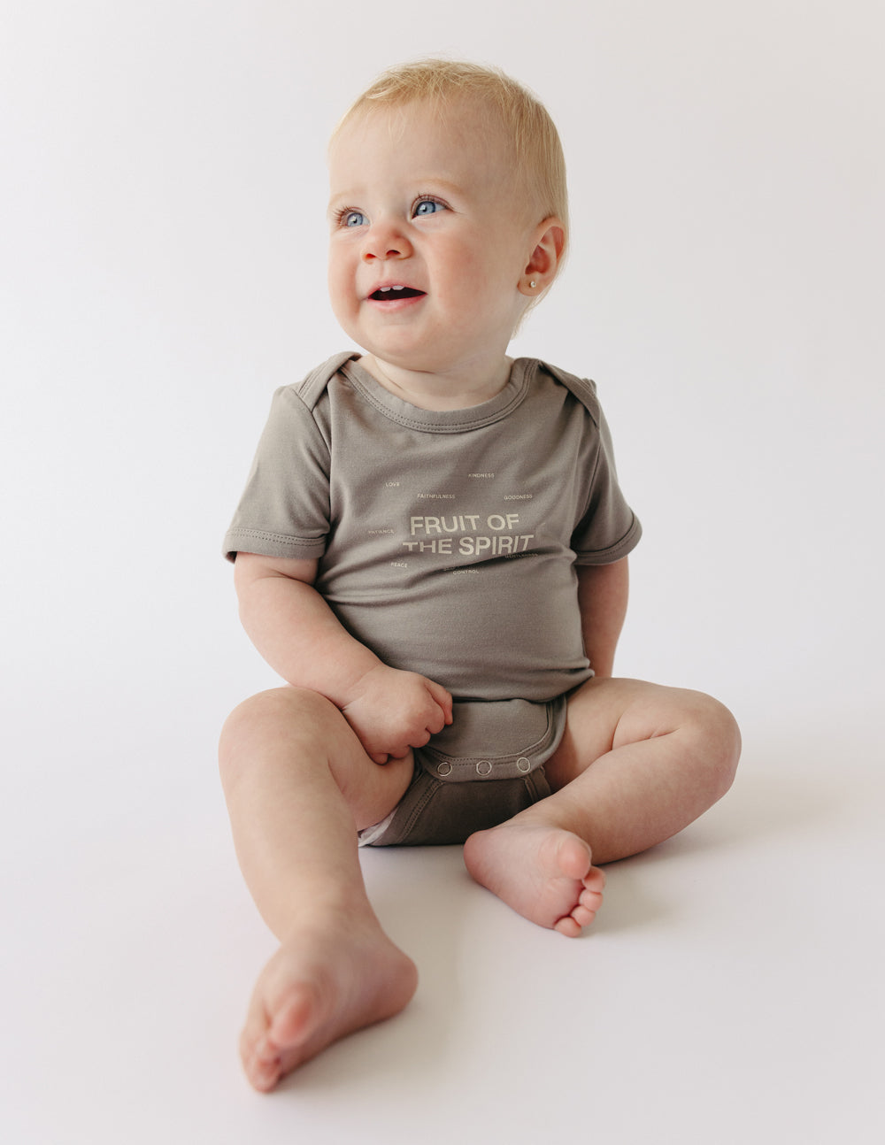 Elevated Faith Fruit of the Spirit Onesie — main product shot