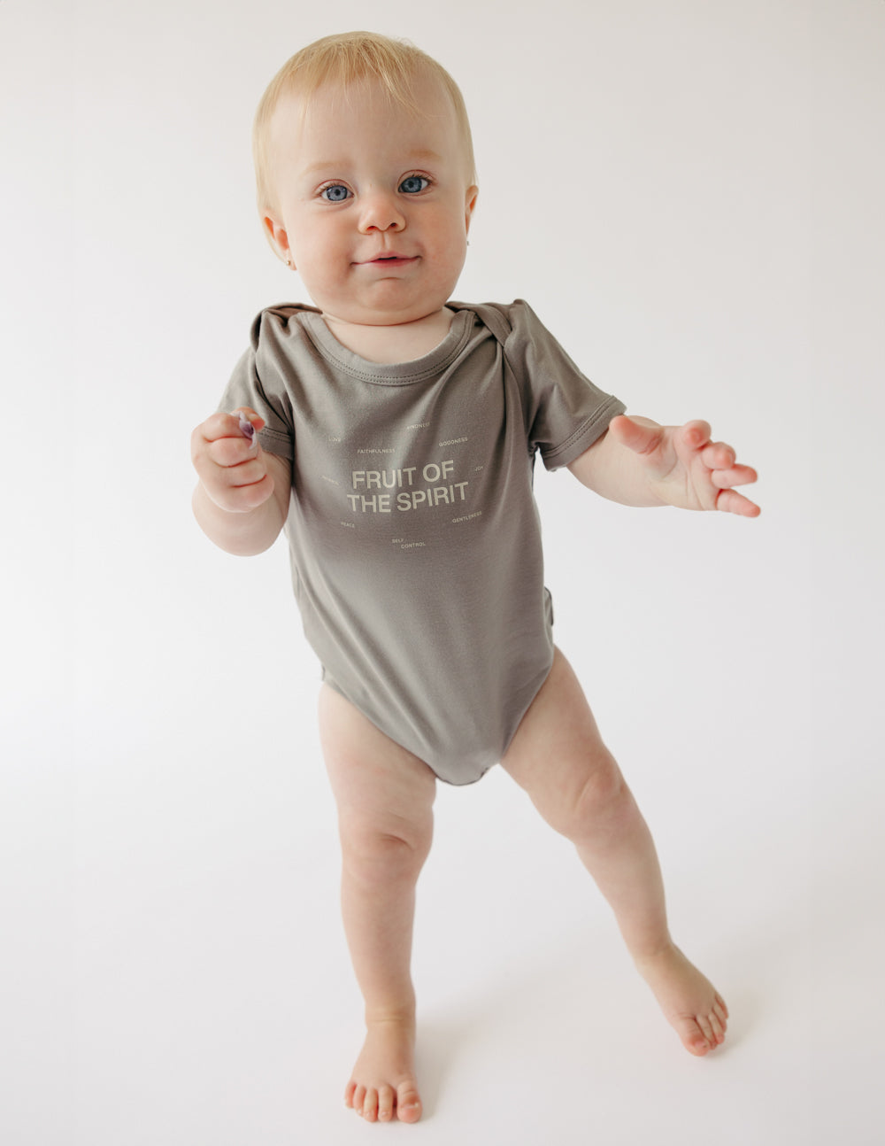 Elevated Faith Fruit of the Spirit Onesie — detail close-up