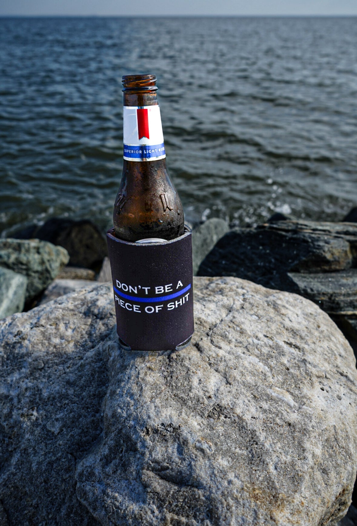 VisiBlue DBAPOS KOOZIE — lifestyle context