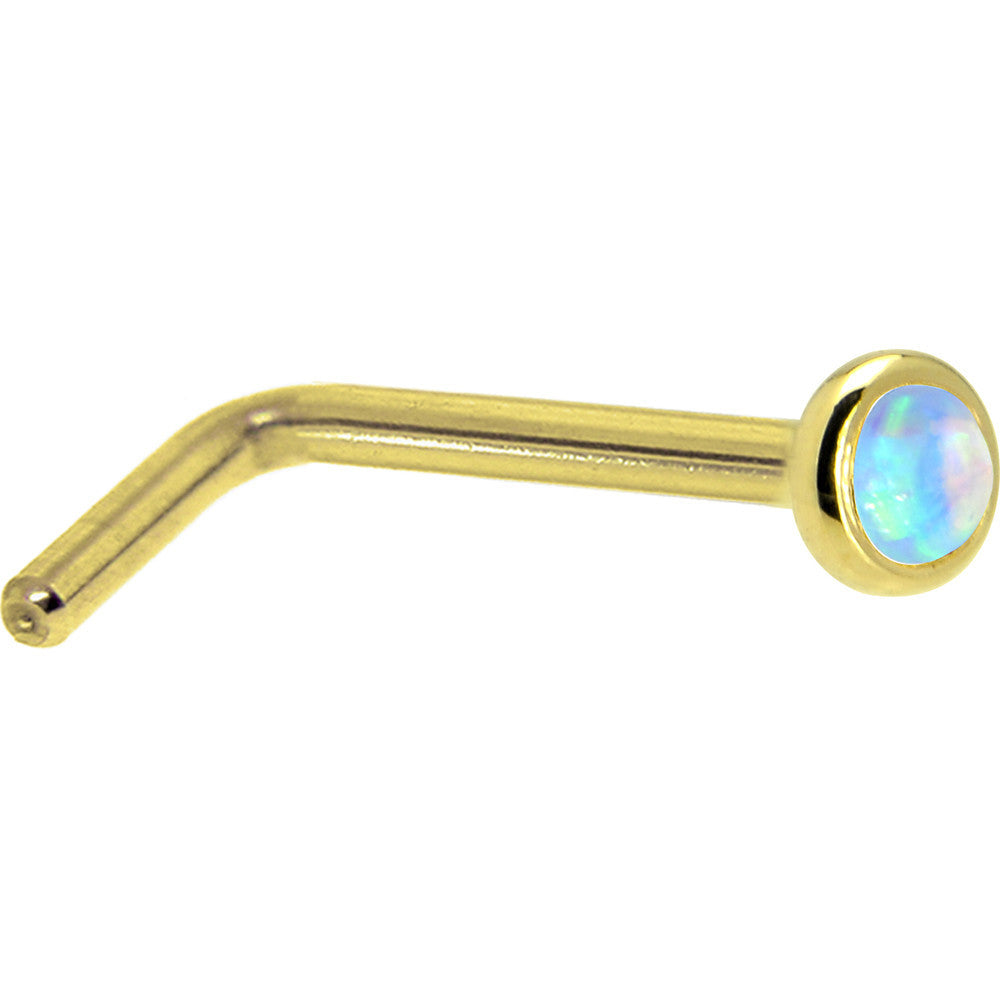 BodyCandy Solid 14K Yellow Gold 2mm Light Blue Synthetic Opal Nose Ring — lifestyle context