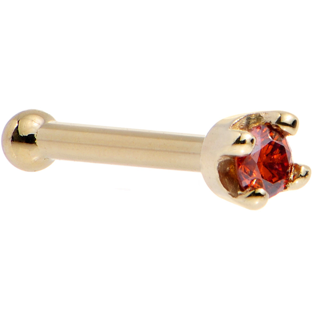 BodyCandy Solid 14K Yellow Gold 1.5mm Genuine Red Diamond Nose Ring — flat-lay composition