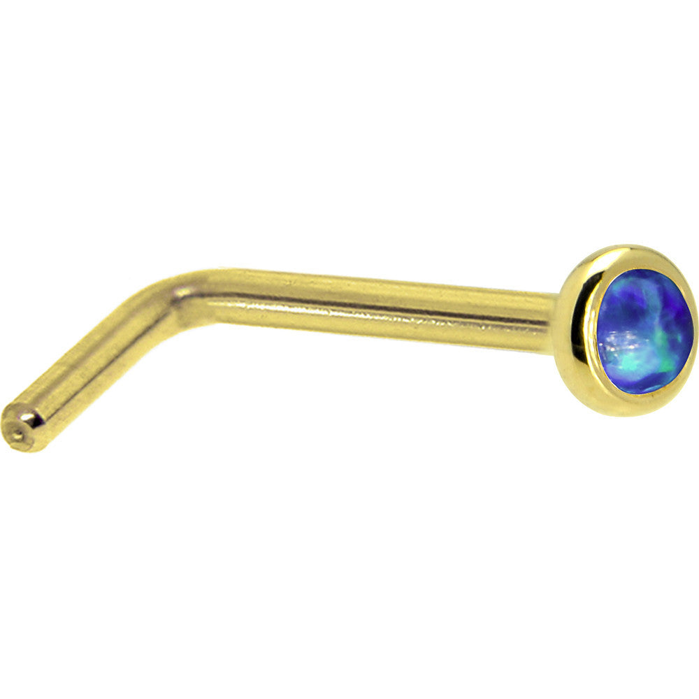 BodyCandy Solid 14K Yellow Gold 2mm Dark Blue Synthetic Opal Nose Ring — lifestyle context