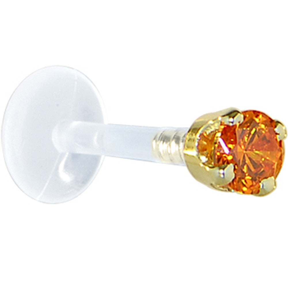 BodyCandy 16G 1/4 Solid 14K Yellow Gold 3mm Orange Cubic Zirconia Bioplast Tragus Earring Stud — detail close-up