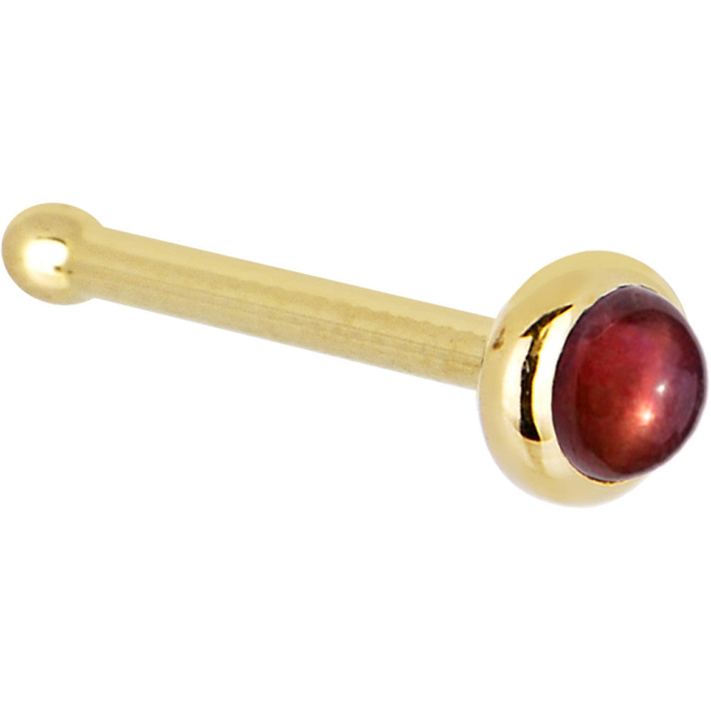 BodyCandy Solid 14K Yellow Gold 2mm Red Garnet Nose Ring — detail close-up