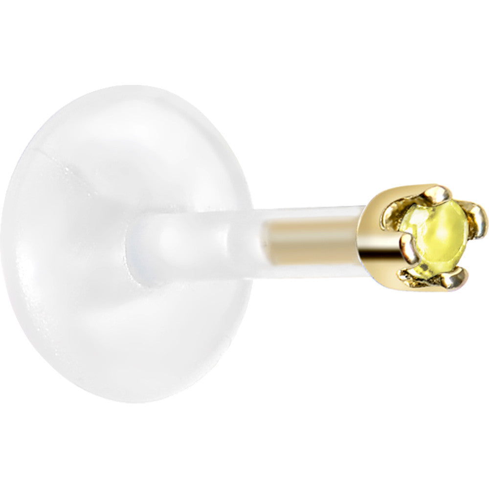 BodyCandy 16G 1/4 14K Yellow Gold November 1.5mm CZ Bioplast Push in Cartilage Earring — detail close-up