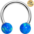 BodyCandy 14G Solid 14K White Gold Blue Synthetic Opal Horseshoe Barbell — main product shot