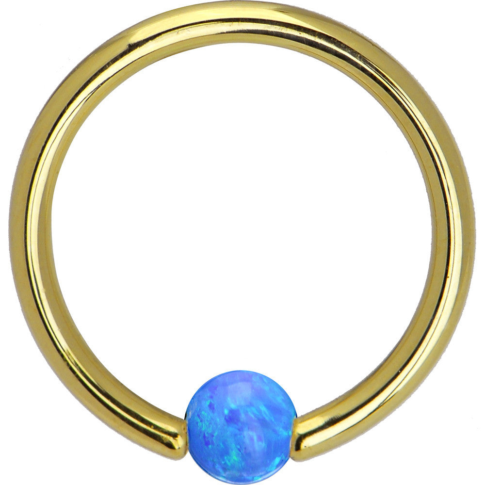 BodyCandy 14G 3/8 Solid 14K Gold Blue Synthetic Opal Captive Ring — detail close-up