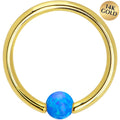 BodyCandy 14G 3/8 Solid 14K Gold Blue Synthetic Opal Captive Ring — main product shot