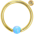 BodyCandy 14G 3/8 Solid 14K Gold Light Blue Synthetic Opal Captive Ring — main product shot